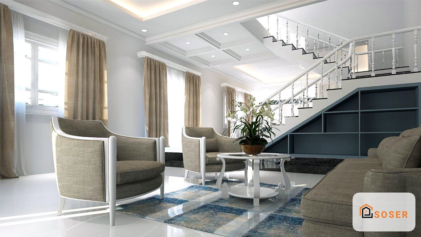 Soggiorno moderno con scale interne, sedie beige, pavimento lucido e ampi infissi