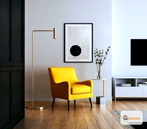 Soggiorno moderno con parete bianca, pavimento in legno, poltrona gialla e dettagli di design contemporaneo
